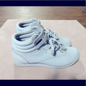 Ice blue Reebok Freestyle Hi-tops